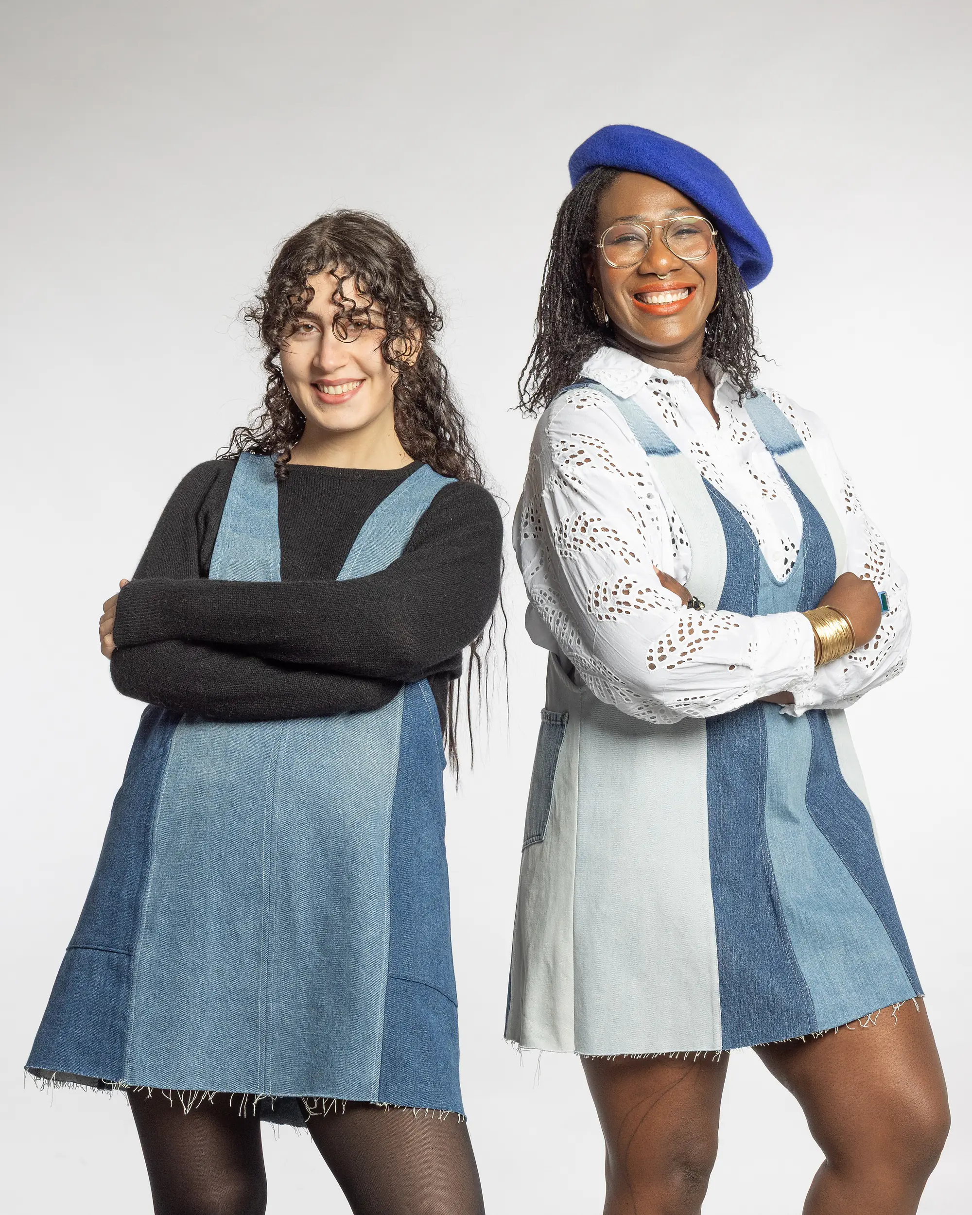 Two models wearing the Bluebell denim dress