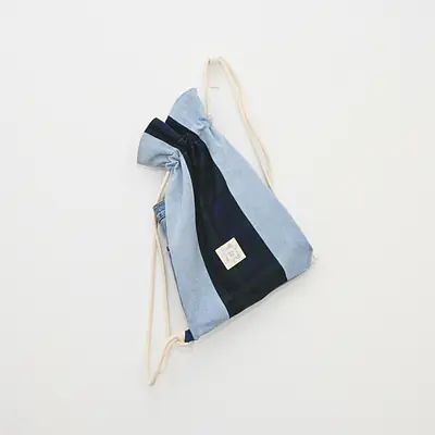 Azuri Reclaimed Denim Backpack - Black Watch Tartan Centre primary image